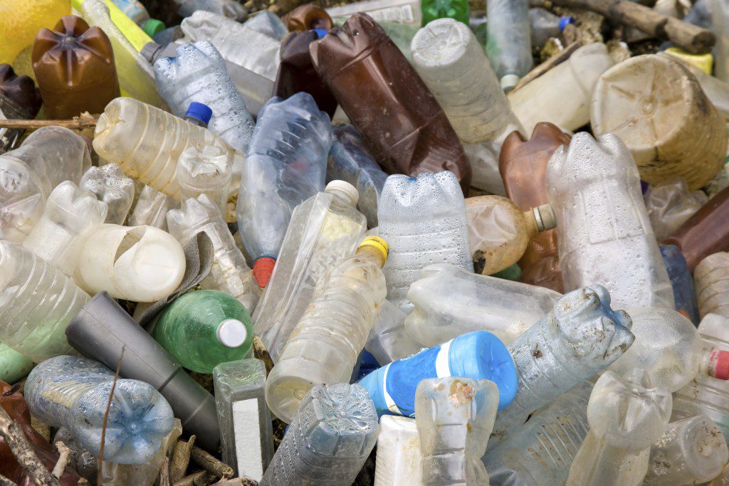 A big pile of used thrown plastic bottles