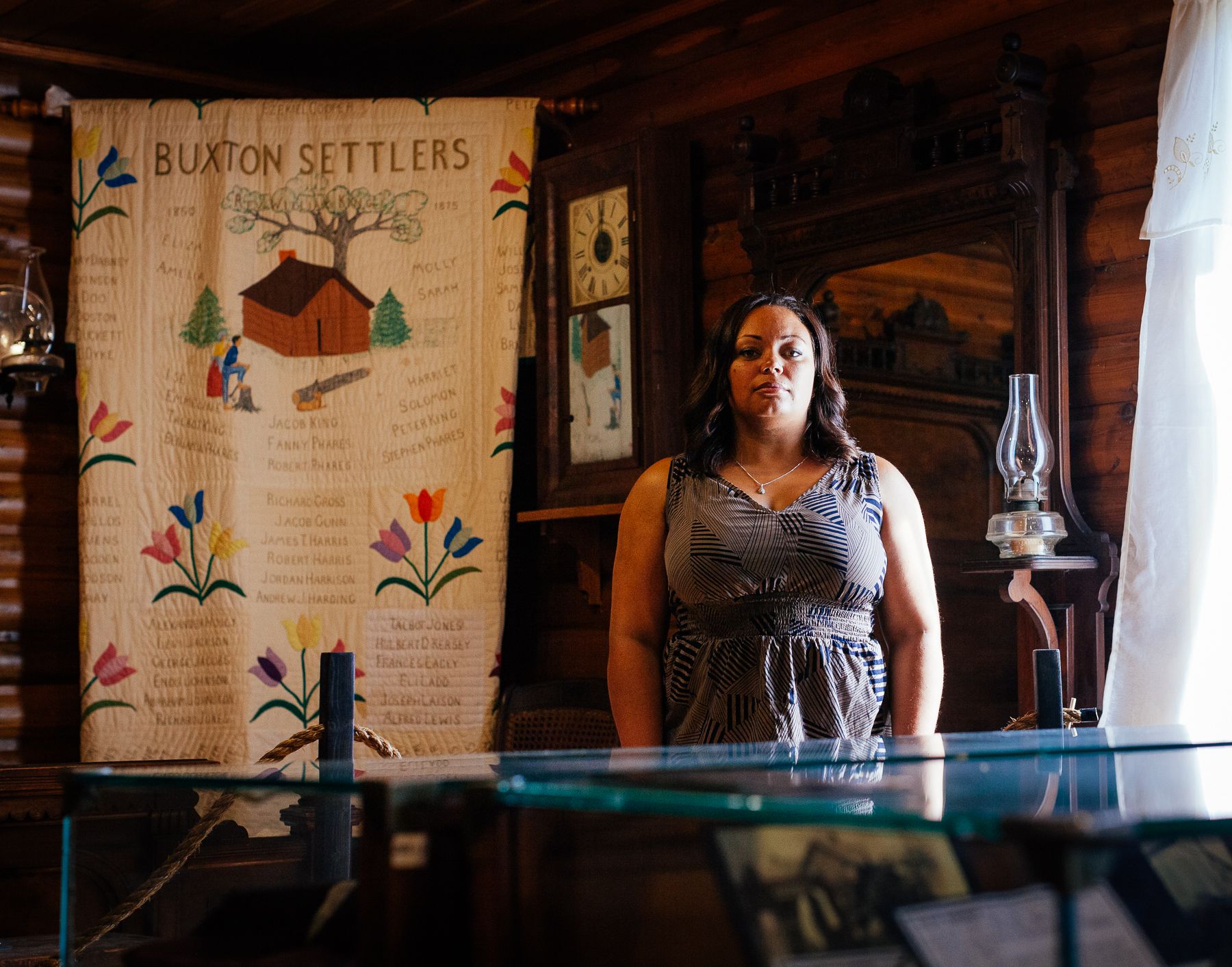 6 Michelle stands amongst an exhibit in the Buxton National Historic Museum opened in 1967 to collect, preserve, exhibit, and interpret historical artifacts related to the community settlers and their descendants.
